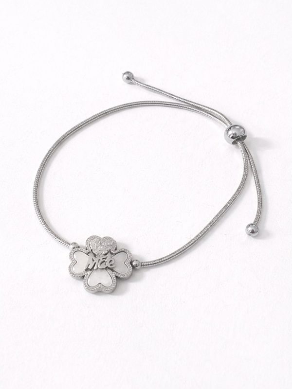 Pulseira ajustável em aço com pendente em forma de flor, inscrição Mãe e detalhes brilhantes