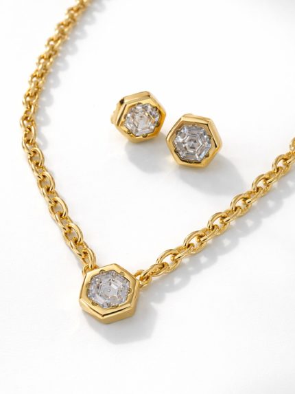 Brincos Hexagonais em Aço Dourado com Pedra Brilhante – foto 2