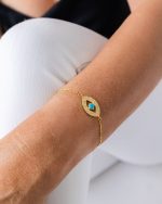 Pulseira olho azul em prata banhada a ouro