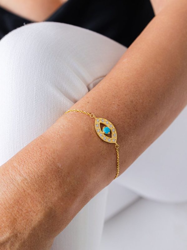 Pulseira olho azul em prata banhada a ouro