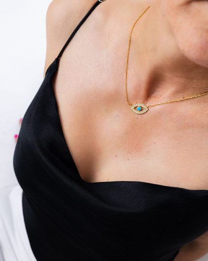 Colar Essence X com pendente em forma de olho e pedra azul